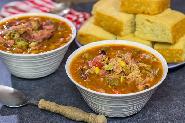 It's not often you get to include BBQ sauce in a stew!  This Brunswick Stew is loaded with smoked meats and veggies - perfect comfort food for a cold winter night!