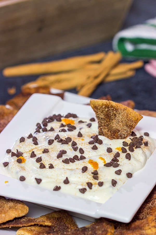Don't forget the sweet treats on your appetizer table! This Cannoli Dip with Cinnamon Sugar Pita Chips takes almost no time to make. It's sure to be a party favorite!