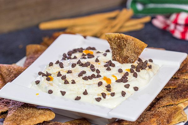 Don't forget the sweet treats on your appetizer table! This Cannoli Dip with Cinnamon Sugar Pita Chips takes almost no time to make. It's sure to be a party favorite!