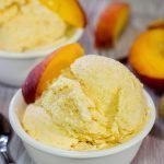 Is it a scorcher outside today?  Cool off with ice cream!  Celebrate peach season with a batch of this Homemade Peach Ice Cream!