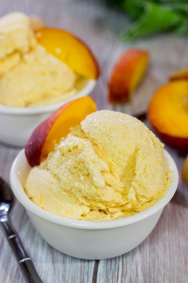 Is it a scorcher outside today? Cool off with ice cream! Celebrate peach season with a batch of this Homemade Peach Ice Cream!