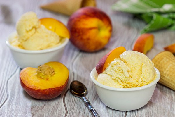 Is it a scorcher outside today? Cool off with ice cream! Celebrate peach season with a batch of this Homemade Peach Ice Cream!