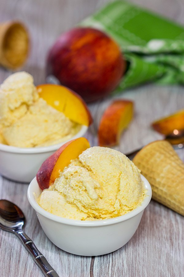 Is it a scorcher outside today? Cool off with ice cream! Celebrate peach season with a batch of this Homemade Peach Ice Cream!