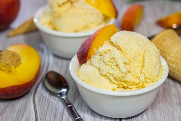Is it a scorcher outside today? Cool off with ice cream! Celebrate peach season with a batch of this Homemade Peach Ice Cream!