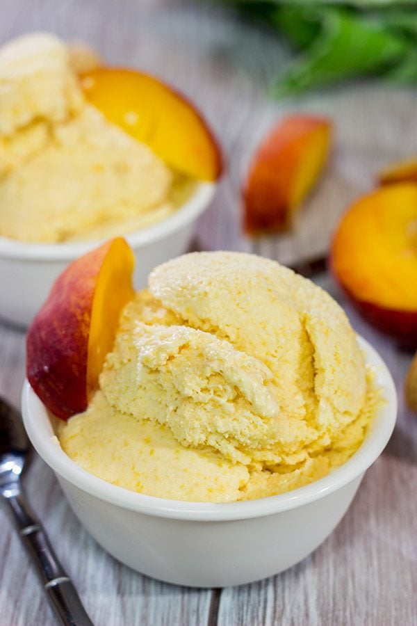 Is it a scorcher outside today? Cool off with ice cream! Celebrate peach season with a batch of this Homemade Peach Ice Cream!