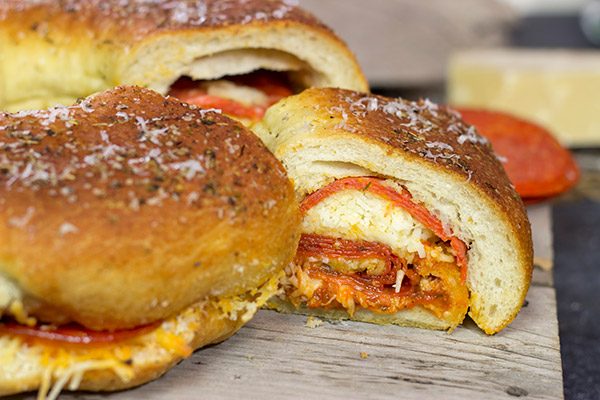A cross between pizza and a sandwich, this Pepperoni Pizza Bundtwich is packed with flavor! It's the perfect gameday appetizer!