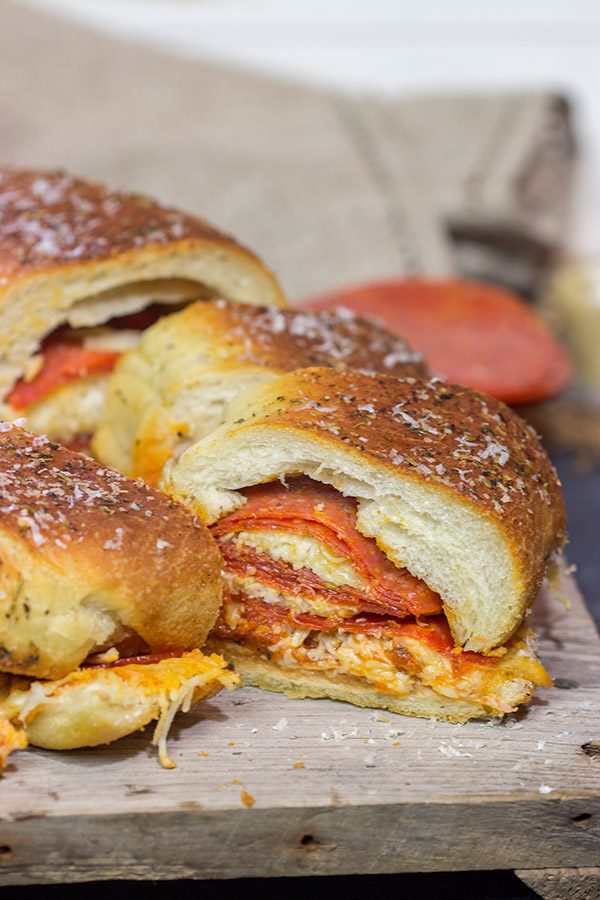 A cross between pizza and a sandwich, this Pepperoni Pizza Bundtwich is packed with flavor!  It's the perfect gameday appetizer!