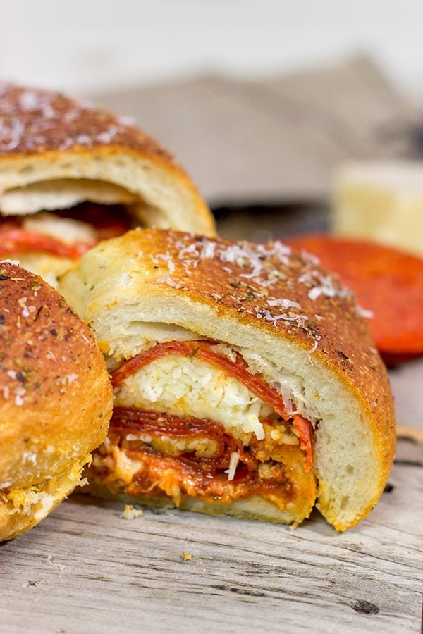 A cross between pizza and a sandwich, this Pepperoni Pizza Bundtwich is packed with flavor!  It's the perfect gameday appetizer!