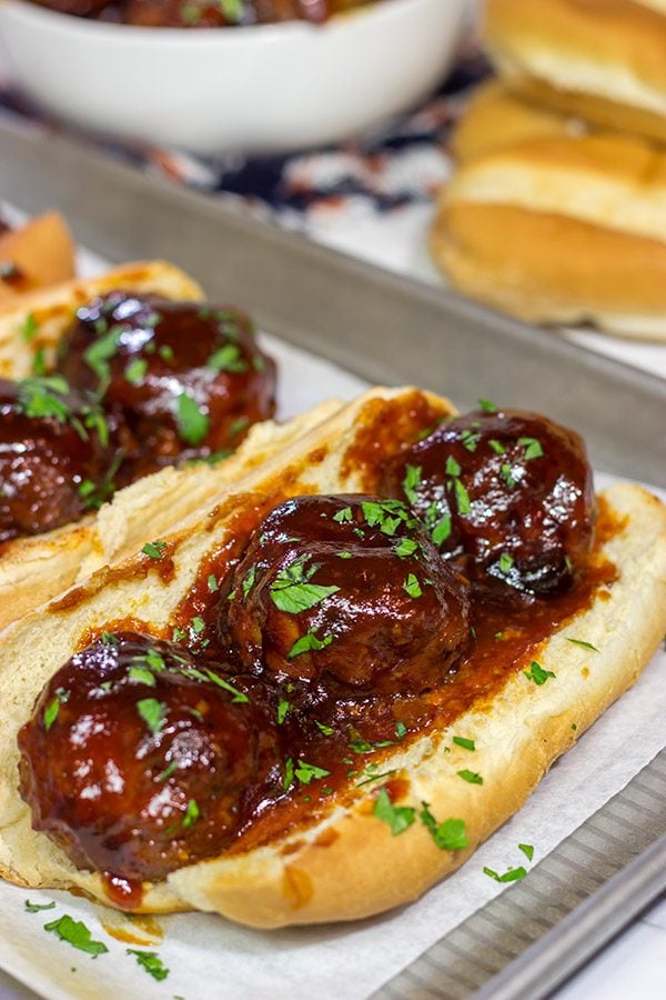 These Slow Cooker BBQ Meatball Subs are an easy and delicious comfort dinner. Perfect for cold winter days!