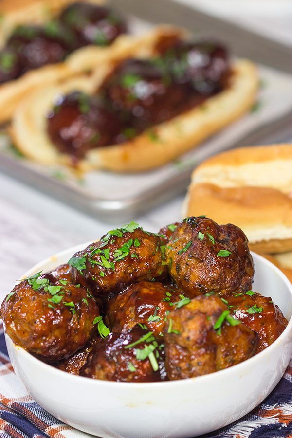 These Slow Cooker BBQ Meatball Subs are an easy and delicious comfort dinner.  Perfect for cold winter days!
