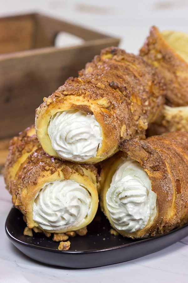 Trdelnik is a unique cinnamon sugar pastry found throughout Prague. Often filled with whipped cream and Nutella, Trdelnik are a delicious sweet treat!