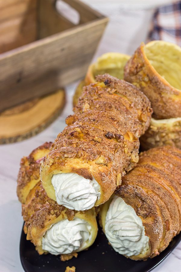 Trdelnik is a unique cinnamon sugar pastry found throughout Prague. Often filled with whipped cream and Nutella, Trdelnik are a delicious sweet treat!