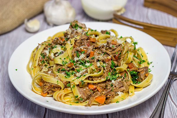 This Beef Short Rib Bolognese is a delicious comfort food meal that's perfect for winter!  Requiring just 30 minutes of prep time, this recipe is surprisingly easy, too!
