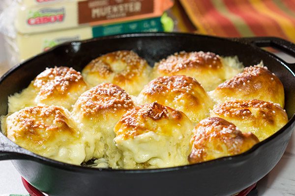 Filled with 2 types of Cabot cheese, these Cheesy Stuffed Pretzel Bites are the perfect way to celebrate Oktoberfest and gamedays in the Fall!