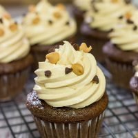 These Chocolate Peanut Butter Cupcakes are a classic sweet treat. Topped with a creamy frosting, these cupcakes are sure to be a hit in your house!