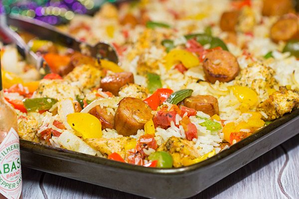 Looking for an easy and delicious dinner idea? This Sheet Pan Jambalaya is a new favorite in our house! (And it tastes amazing for leftover lunch the next day, too!)