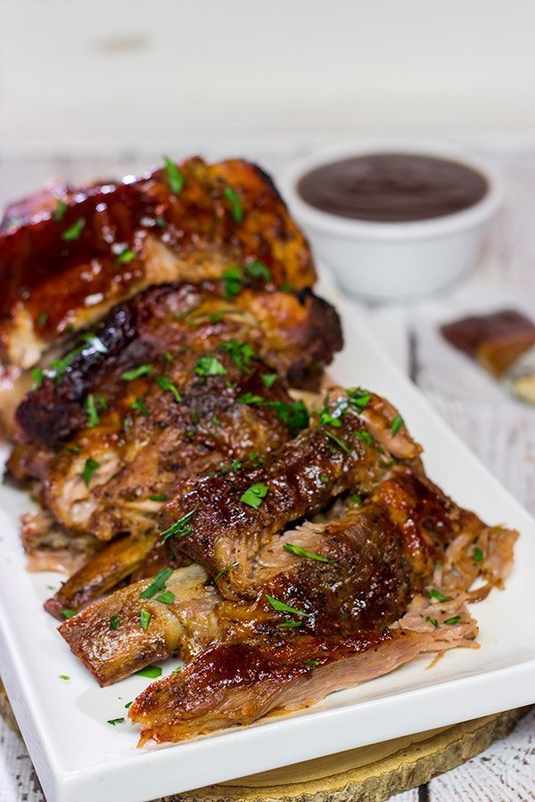 Too cold to pull out the grill?  Use the slow cooker instead!  These fall-off-the-bone Slow Cooker Baby Back Ribs are a delicious way to enjoy barbecue indoors!