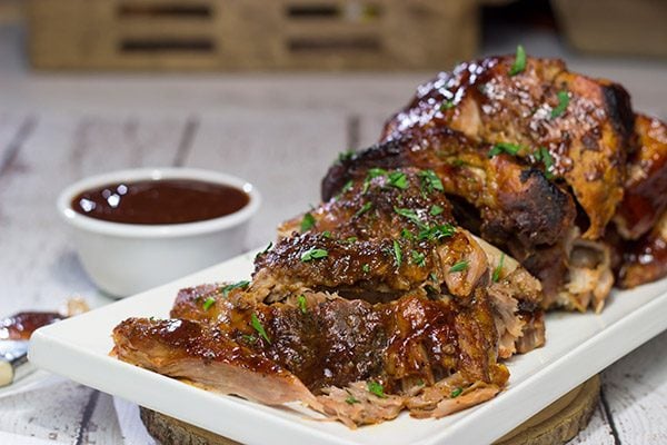 Too cold to pull out the grill?  Use the slow cooker instead!  These fall-off-the-bone Slow Cooker Baby Back Ribs are a delicious way to enjoy barbecue indoors!