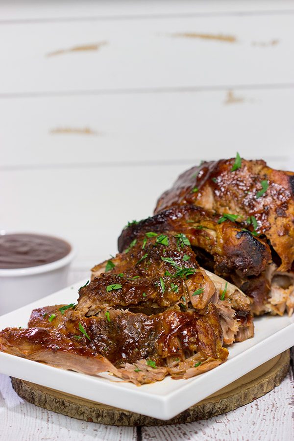 Too cold to pull out the grill?  Use the slow cooker instead!  These fall-off-the-bone Slow Cooker Baby Back Ribs are a delicious way to enjoy barbecue indoors!