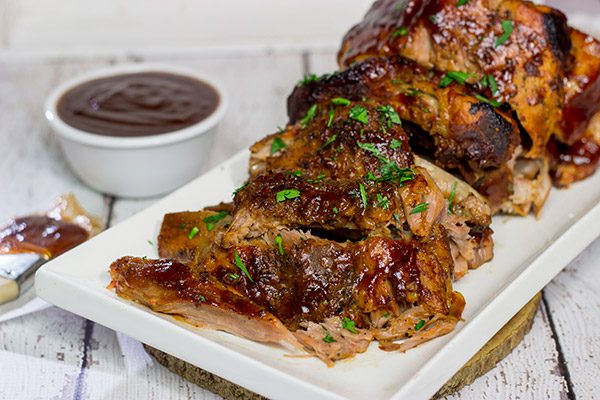 Too cold to pull out the grill?  Use the slow cooker instead!  These fall-off-the-bone Slow Cooker Baby Back Ribs are a delicious way to enjoy barbecue indoors!