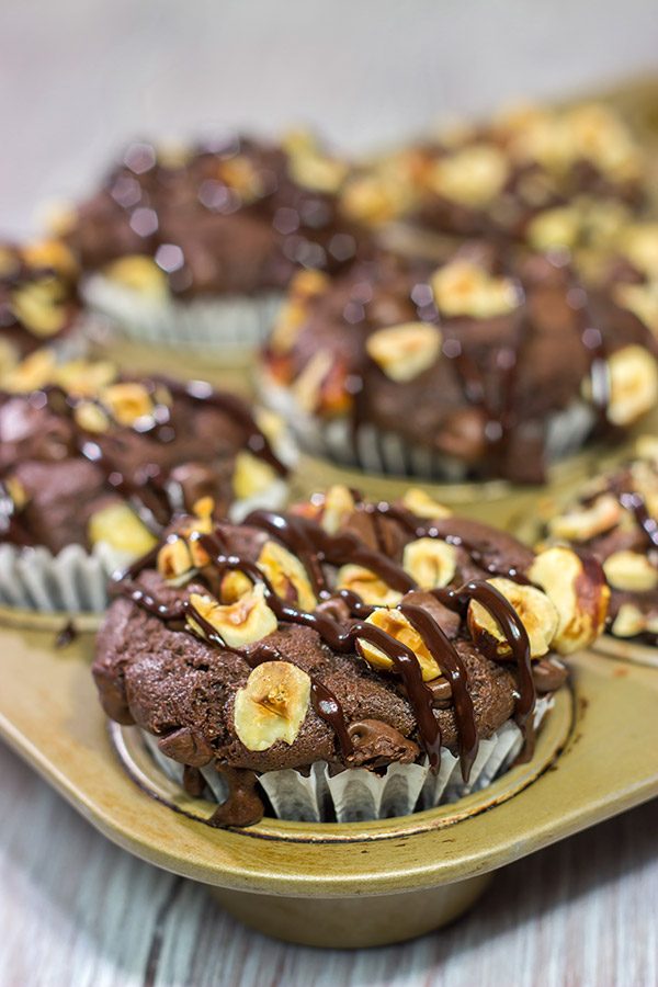 Topped with chocolate chips and chopped hazelnuts, these Chocolate Hazelnut Muffins make for an excellent morning...or afternoon...treat!
