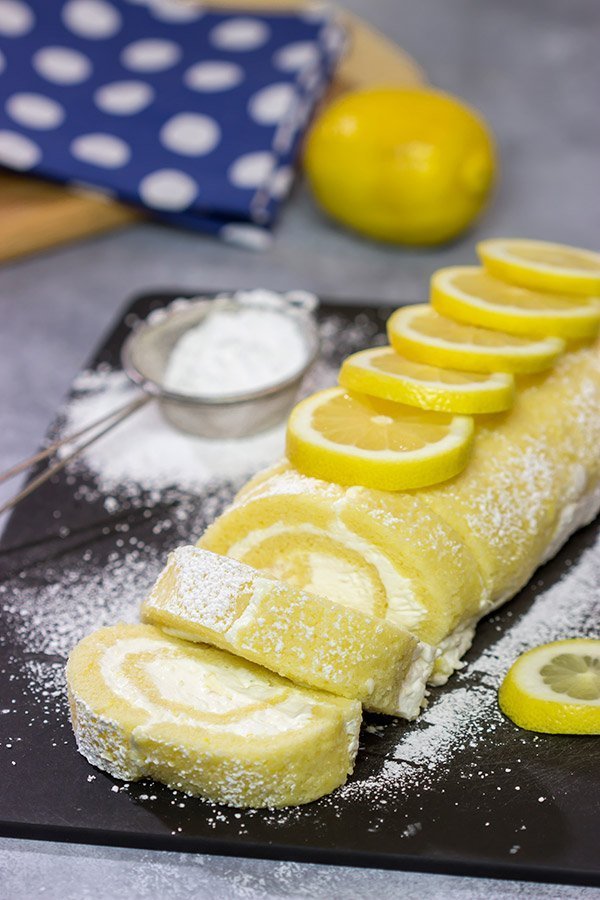 Filled with a whipped cream frosting, this Lemon Cake Roll is a fun dessert for warmer days!