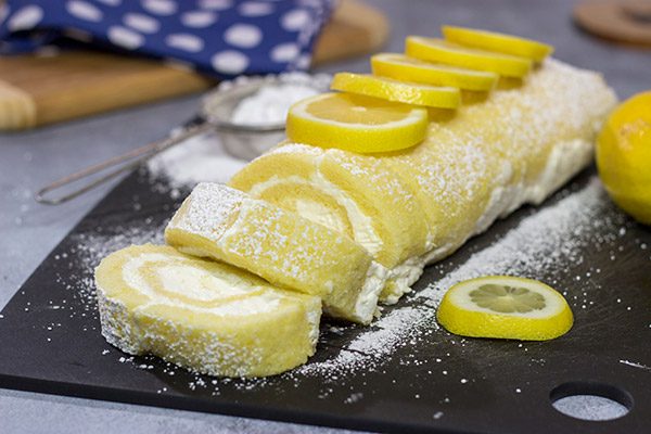 Filled with a whipped cream frosting, this Lemon Cake Roll is a fun dessert for warmer days!