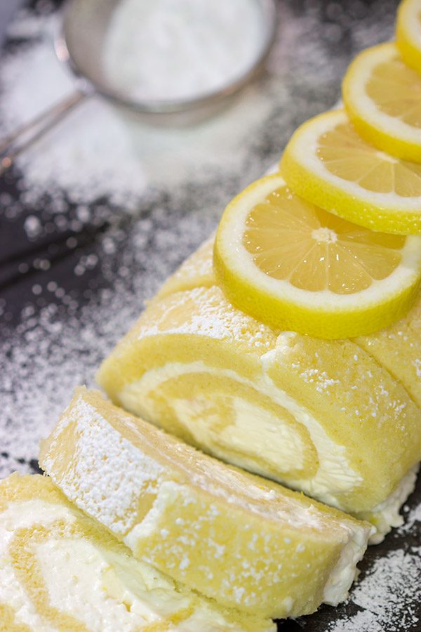 Filled with a whipped cream frosting, this Lemon Cake Roll is a fun dessert for warmer days!