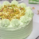This Lemon Pistachio Cake uses pudding mix in both the cake and frosting for an extra creamy (and extra delicious) cake!