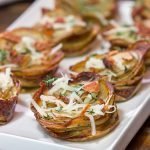 Topped with your favorite baked potato toppings, these Muffin Tin Loaded Baked Potatoes are a fun and tasty side dish!
