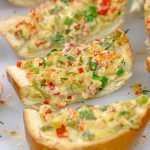 New Orleans Crawfish Bread is a Jazz Fest favorite!  Can't make it to Jazz Fest this year?  Make a batch of this crawfish bread at home instead!