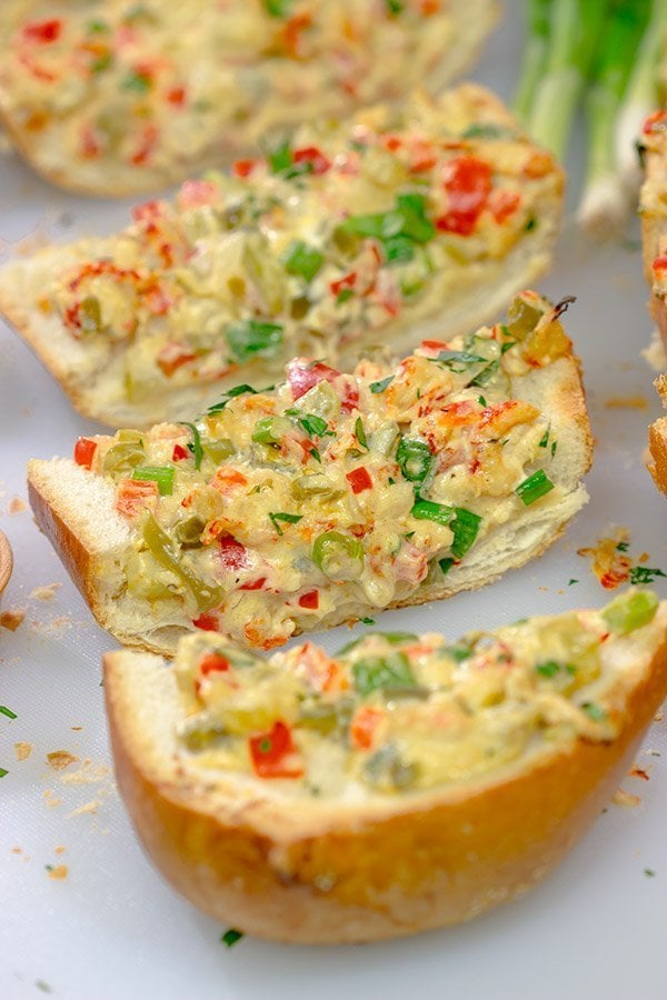 New Orleans Crawfish Bread is a Jazz Fest favorite!  Can't make it to Jazz Fest this year?  Make a batch of this crawfish bread at home instead!
