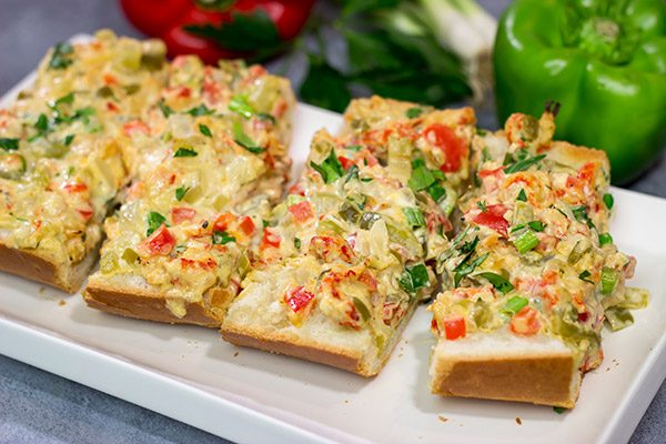New Orleans Crawfish Bread is a Jazz Fest favorite! Can't make it to Jazz Fest this year? Make a batch of this crawfish bread at home instead!