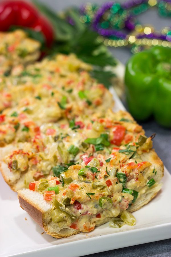 New Orleans Crawfish Bread is a Jazz Fest favorite! Can't make it to Jazz Fest this year? Make a batch of this crawfish bread at home instead!