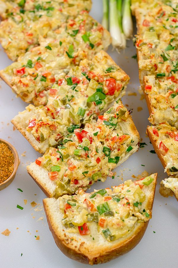 New Orleans Crawfish Bread is a Jazz Fest favorite! Can't make it to Jazz Fest this year? Make a batch of this crawfish bread at home instead!