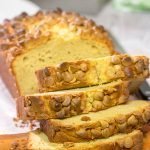 Topped with peanut butter baking chips, this Peanut Butter Bread is a moist cake-like quick bread that's perfect for snacking or dessert!