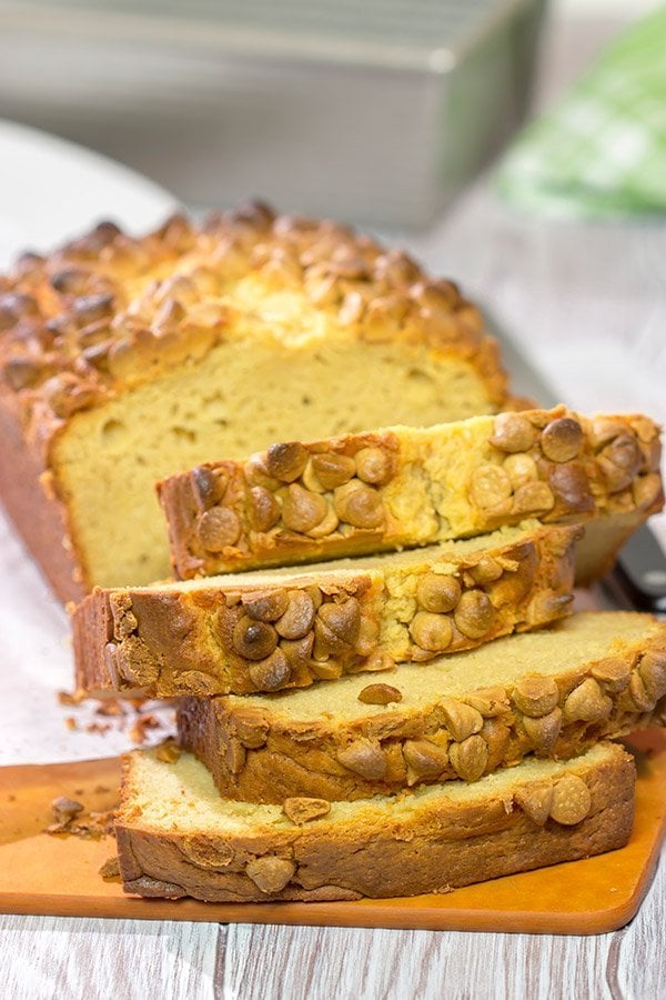 Topped with peanut butter baking chips, this Peanut Butter Bread is a moist cake-like quick bread that's perfect for snacking or dessert!