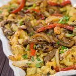 Think mac and cheese is delicious?  Try adding thinly sliced steak, peppers and onions!  This Philly Cheesesteak Mac and Cheese is packed with flavor, and it's a definite favorite!