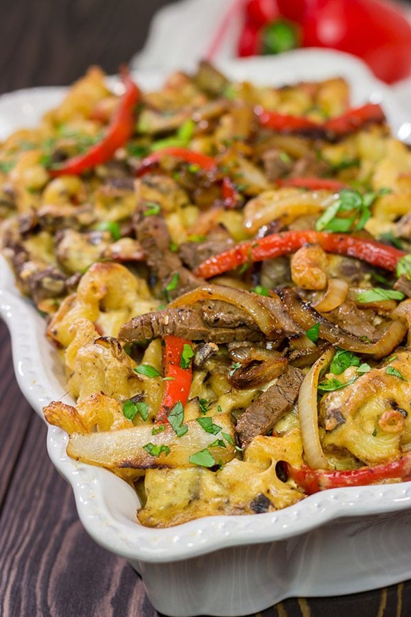Think mac and cheese is delicious?  Try adding thinly sliced steak, peppers and onions!  This Philly Cheesesteak Mac and Cheese is packed with flavor, and it's a definite favorite!