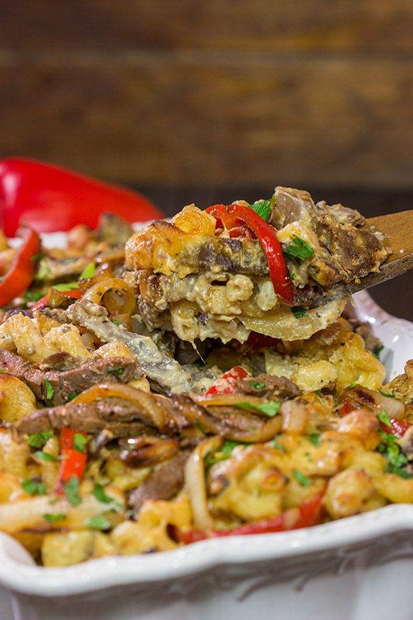 Think mac and cheese is delicious?  Try adding thinly sliced steak, peppers and onions!  This Philly Cheesesteak Mac and Cheese is packed with flavor, and it's a definite favorite!