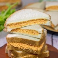 Pimiento Cheese Sandwiches are a classic Southern recipe. These tasty sandwiches are incredibly easy to make, and they're an excellent choice for a fun party appetizer!