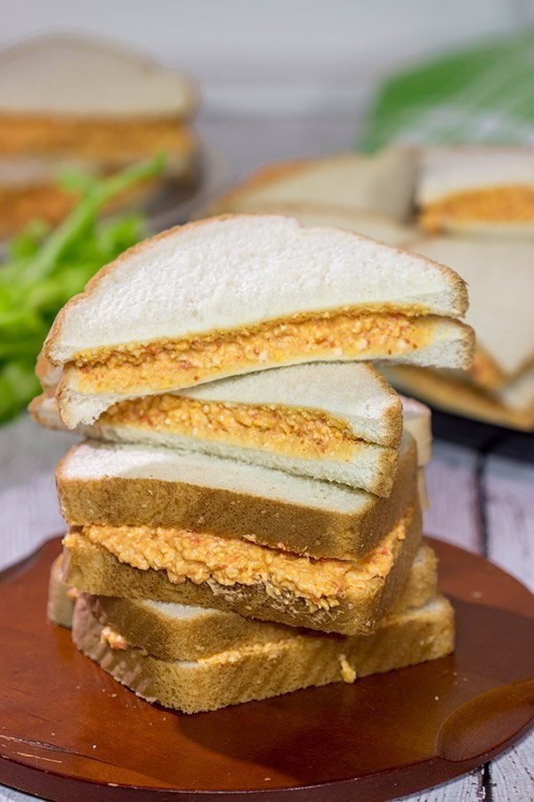 Pimiento Cheese Sandwiches are a classic Southern recipe.  These tasty sandwiches are incredibly easy to make, and they're an excellent choice for a fun party appetizer!