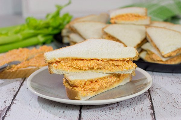 Pimiento Cheese Sandwiches are a classic Southern recipe.  These tasty sandwiches are incredibly easy to make, and they're an excellent choice for a fun party appetizer!