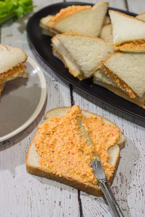Pimiento Cheese Sandwiches are a classic Southern recipe.  These tasty sandwiches are incredibly easy to make, and they're an excellent choice for a fun party appetizer!
