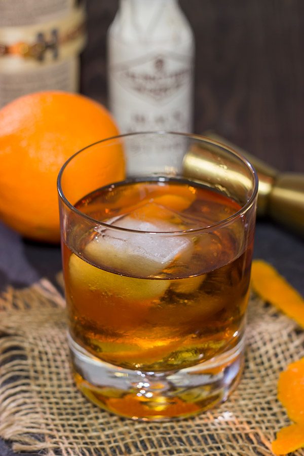 This Smoked Old Fashioned introduces maple syrup and smoke for a fun twist on a classic cocktail!