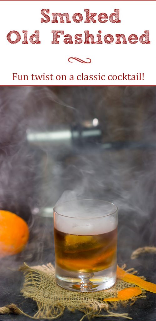 This Smoked Old Fashioned introduces maple syrup and smoke for a fun twist on a classic cocktail!