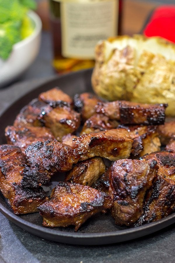 Looking for a fun marinade idea?  Pull out the bottle of bourbon!  These Bourbon Marinated Steak Tips make for a delicious (and easy) dinner idea!