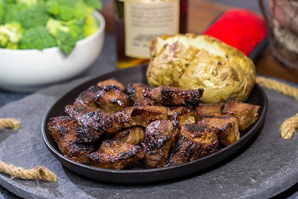 Looking for a fun marinade idea? Pull out the bottle of bourbon! These Bourbon Marinated Steak Tips make for a delicious (and easy) dinner idea!