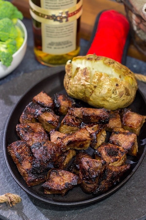 Looking for a fun marinade idea? Pull out the bottle of bourbon! These Bourbon Marinated Steak Tips make for a delicious (and easy) dinner idea!