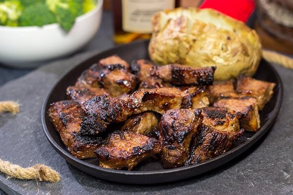 Looking for a fun marinade idea? Pull out the bottle of bourbon! These Bourbon Marinated Steak Tips make for a delicious (and easy) dinner idea!